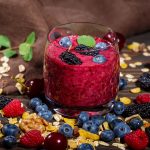glass-of-smoothies-with-fresh-berries-FR2J9GL